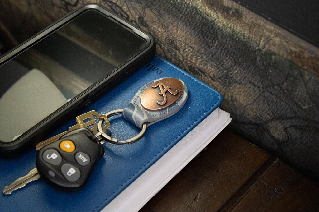 Alabama Crimson Tide Oval Camo Leather Key Fob.