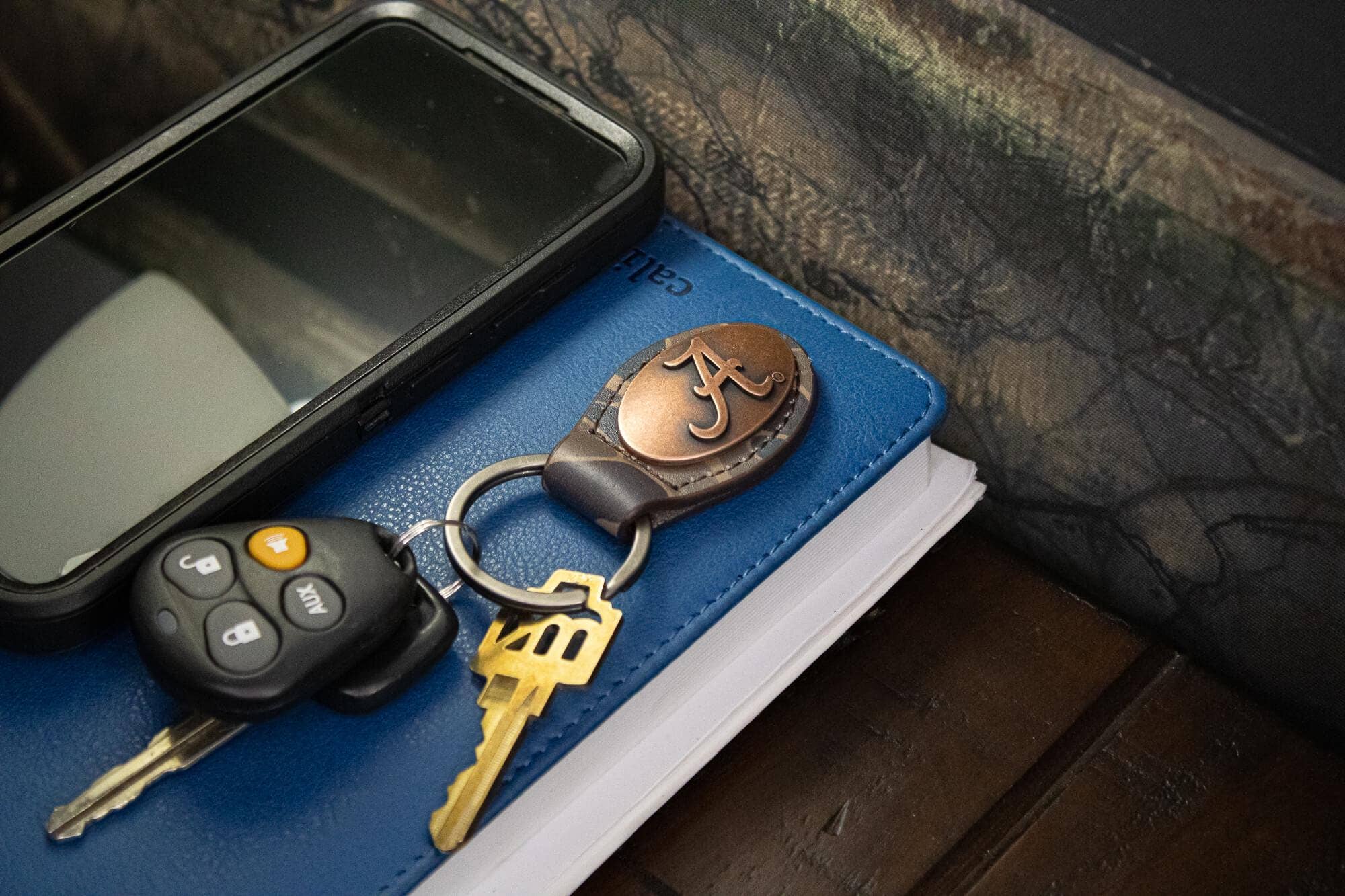 Alabama Crimson Tide Oval Camo Leather Key Fob.