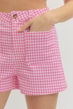Gingham shorts featuring button closure at front.