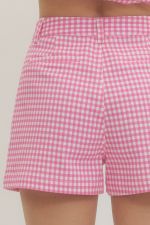 Gingham shorts featuring button closure at front.